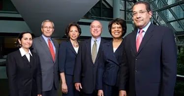 Attorneys speaking together in a law office